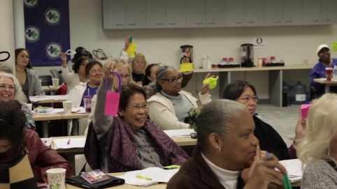 Members of UNAC/UHCP show off their inventions during an innovation workshop