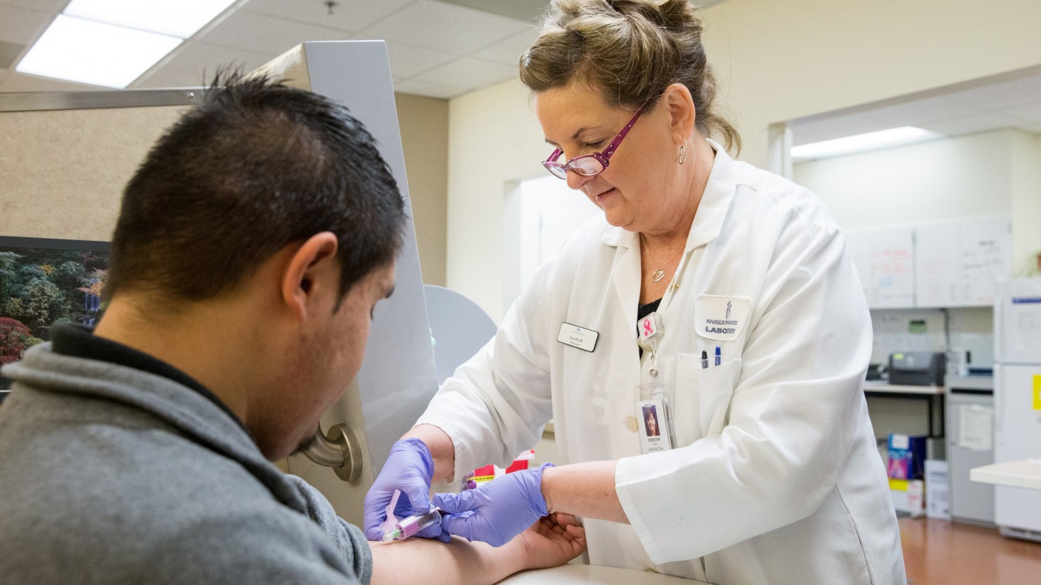 Phlebotomist drawing blood